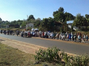 The procession from the church near the college